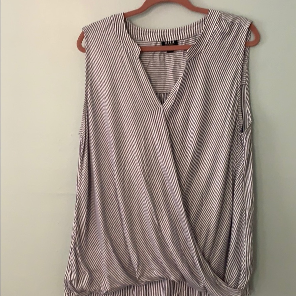 Blue and white striped sleeveless top